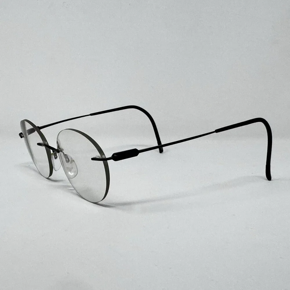 Silhouette 5561 70 9040 86D Rimless Eyeglass Frames Black 19-150 Austria